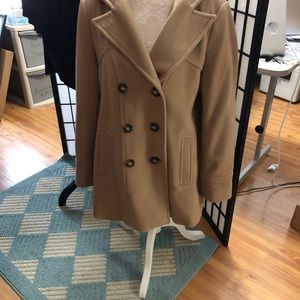 Wool coat 60 %.